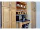 Well-equipped kitchen corner with cabinets and a coffee bar at 1801 Witt Rd, Lebanon, IN 46052