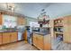 Updated kitchen with stainless steel appliances and wood cabinets at 1801 Witt Rd, Lebanon, IN 46052