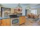 Modern kitchen with stainless steel range and pot rack at 1801 Witt Rd, Lebanon, IN 46052