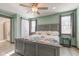 Bright main bedroom with a barn door and floral bedding at 1801 Witt Rd, Lebanon, IN 46052