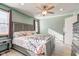 Serene main bedroom with soft green walls and floral bedding at 1801 Witt Rd, Lebanon, IN 46052