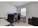 Home office with two desks, chairs, and ample workspace at 1801 Witt Rd, Lebanon, IN 46052