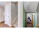 Stairwell and view into Gathering room with fireplace at 1801 Witt Rd, Lebanon, IN 46052