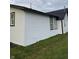 White vinyl siding with black window frames on the side of the house at 2722 Collier St, Indianapolis, IN 46241