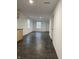 Open living area with dark grey tile floors at 2722 Collier St, Indianapolis, IN 46241