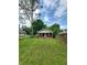 Traditional home with a lovely front porch and an expansive green lawn with mature trees at 2817 S Rybolt Ave, Indianapolis, IN 46241