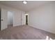Spacious bedroom with plush carpet and neutral walls at 3156 Graceland Ave, Indianapolis, IN 46208