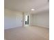 Large bedroom with plush carpet and lots of natural light at 3156 Graceland Ave, Indianapolis, IN 46208