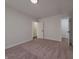 Spacious bedroom with neutral walls and plush carpeting at 3156 Graceland Ave, Indianapolis, IN 46208