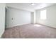 Bright bedroom featuring neutral walls and plush carpeting at 3156 Graceland Ave, Indianapolis, IN 46208