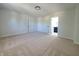 Spacious bedroom with neutral carpeting and en-suite bathroom at 3156 Graceland Ave, Indianapolis, IN 46208