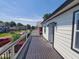 Private deck overlooking a residential street with mature trees at 3156 Graceland Ave, Indianapolis, IN 46208