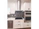 Modern kitchen featuring stainless steel appliances and white shaker cabinets at 3156 Graceland Ave, Indianapolis, IN 46208
