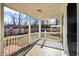 Screened-in back porch with white railings and wood decking at 3415 Delmar Ave, Indianapolis, IN 46241
