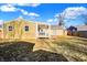 House's back elevation, backyard, and shed at 3415 Delmar Ave, Indianapolis, IN 46241