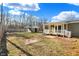 Large backyard with shed and partially covered porch at 3415 Delmar Ave, Indianapolis, IN 46241