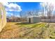 Backyard with shed and partial view of house at 3415 Delmar Ave, Indianapolis, IN 46241
