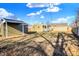 Backyard view of house with shed and wooden fence at 3415 Delmar Ave, Indianapolis, IN 46241