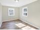 Spacious bedroom with large windows and wood flooring at 3415 Delmar Ave, Indianapolis, IN 46241