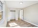 Well-lit bedroom with ample closet space and wood flooring at 3415 Delmar Ave, Indianapolis, IN 46241