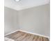 Spacious bedroom with hardwood floors and large window at 3415 Delmar Ave, Indianapolis, IN 46241