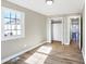 Bright bedroom featuring a large closet and wood floors at 3415 Delmar Ave, Indianapolis, IN 46241