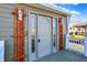 Charming front entry featuring a stylish door and decorative shutters at 3415 Delmar Ave, Indianapolis, IN 46241