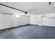 Spacious single-car garage with gray epoxy floor at 3415 Delmar Ave, Indianapolis, IN 46241