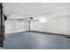 Clean and bright garage featuring an automatic door opener at 3415 Delmar Ave, Indianapolis, IN 46241