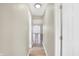Light and bright hallway with wood flooring at 3415 Delmar Ave, Indianapolis, IN 46241