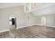 Bright living room featuring hardwood floors and an open floor plan at 3415 Delmar Ave, Indianapolis, IN 46241