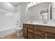 Bathroom with double vanity and shower-tub combo at 4068 Berry Chase Blvd, Greenwood, IN 46143