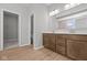 Bathroom with double vanity and open doorway at 4068 Berry Chase Blvd, Greenwood, IN 46143