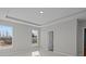 Neutral-toned bedroom featuring tray ceiling and lots of light at 4068 Berry Chase Blvd, Greenwood, IN 46143