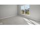 Inviting bedroom with natural light, neutral walls, and carpet at 4068 Berry Chase Blvd, Greenwood, IN 46143