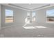 Bright bedroom featuring tray ceiling and carpeted floors at 4068 Berry Chase Blvd, Greenwood, IN 46143