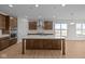 Bright kitchen features an island, stainless hood, and recessed lighting at 4068 Berry Chase Blvd, Greenwood, IN 46143
