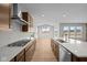 Well-equipped kitchen with wood cabinets, stainless steel appliances, and a center island at 4068 Berry Chase Blvd, Greenwood, IN 46143