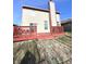 Home with deck, patio, and fenced backyard at 621 Meadows Edge Ln, Indianapolis, IN 46217