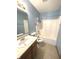 Clean bathroom featuring a bathtub, toilet and vanity at 621 Meadows Edge Ln, Indianapolis, IN 46217