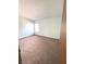 Bedroom with carpet, window, and door at 621 Meadows Edge Ln, Indianapolis, IN 46217