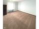Bright bedroom with neutral walls and plush carpeting at 621 Meadows Edge Ln, Indianapolis, IN 46217