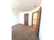 Bedroom with carpet, door to loft, and closet at 621 Meadows Edge Ln, Indianapolis, IN 46217