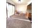 Dining area with glass table and chairs, near sliding door at 621 Meadows Edge Ln, Indianapolis, IN 46217