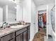Bathroom with vanity, sink, and shower/tub combo at 6232 Emerald Springs Dr, Indianapolis, IN 46221