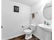 Clean and bright bathroom with a white vanity and a large mirror at 6232 Emerald Springs Dr, Indianapolis, IN 46221