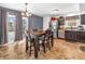 Kitchen with stainless steel appliances and dark brown cabinets at 6232 Emerald Springs Dr, Indianapolis, IN 46221