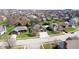 An aerial view showcases the neighborhood with well-maintained lawns at 7709 Santolina Dr, Indianapolis, IN 46237
