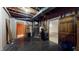 Unfinished basement area featuring exposed ductwork and wooden beams, perfect for customization to suit any need at 7709 Santolina Dr, Indianapolis, IN 46237