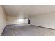 Open basement area with carpeted flooring, ready for customization at 7709 Santolina Dr, Indianapolis, IN 46237